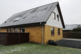 Et typisk 70&#039;er hus, hvor der kan spares endnu mere på energien med korrekt isolering.